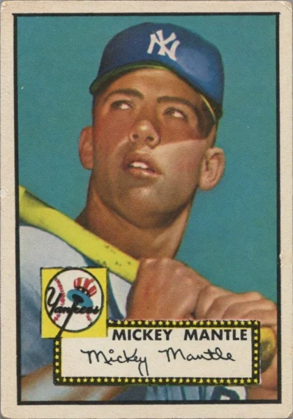 A 1952 Topps Mickey Mantle card in PSA 8 condition
